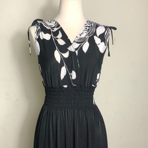 Black and white sleeveless long dress. Gentle used.